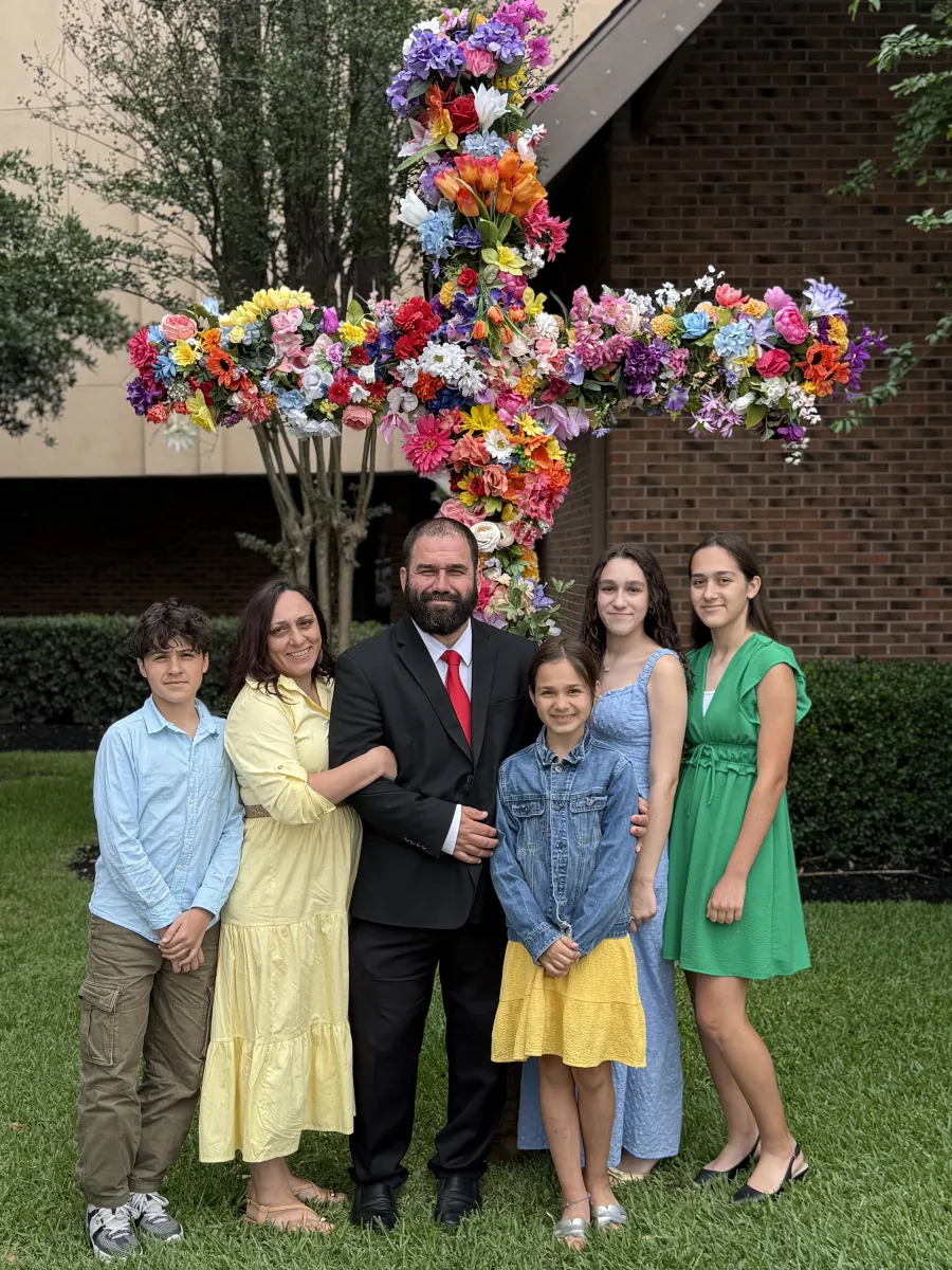 Pastor Art Kamyshin with his family outside First Slavic Baptist Church